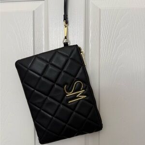 Steve Madden Black Quilted Clutch Bag with gold accents.
